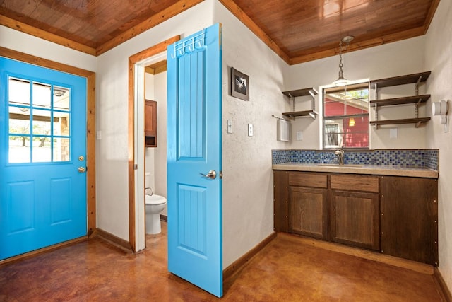 109 N Hill Top Dr, Boerne, TX 78006 - kitchen featuring wood ceiling, open shelves, finished concrete floors, a sink, and baseboards