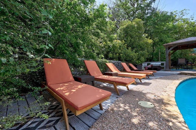 12001 Bittern Holw, Austin, TX 78758 - view of patio / terrace featuring a gazebo and an outdoor pool