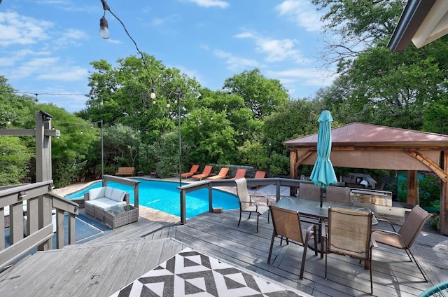 12001 Bittern Holw, Austin, TX 78758 - swimming pool with a gazebo, a wooden deck, and outdoor dining space