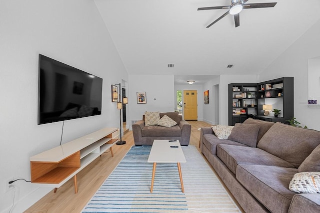12001 Bittern Holw, Austin, TX 78758 - living room featuring light wood-style floors, lofted ceiling, and ceiling fan