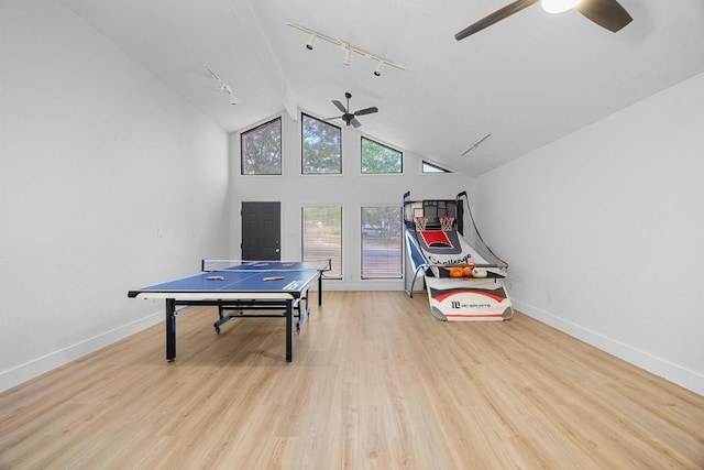 12001 Bittern Holw, Austin, TX 78758 - game room with a ceiling fan, rail lighting, wood finished floors, and vaulted ceiling