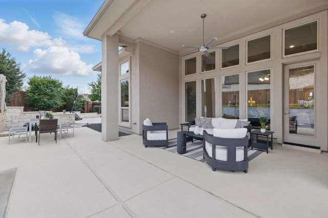 view of patio / terrace with outdoor lounge area, outdoor dining area, ceiling fan, and fence