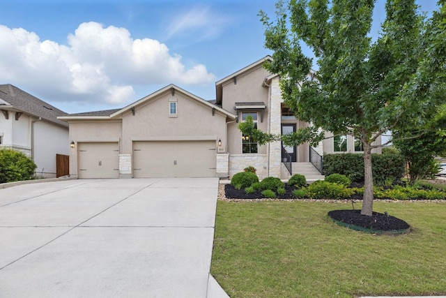 view of front of home with stone siding, a garage, stucco siding, driveway, and a front lawn