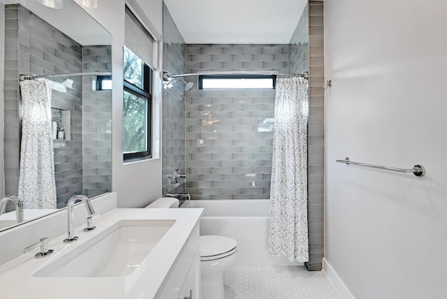 3102 Hunt Trl, Austin, TX 78757 - bathroom featuring tile patterned flooring, shower / bathtub combination with curtain, vanity, and toilet