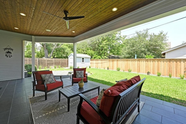 3102 Hunt Trl, Austin, TX 78757 - view of patio / terrace featuring a storage unit, outdoor lounge area, an outdoor structure, and a ceiling fan