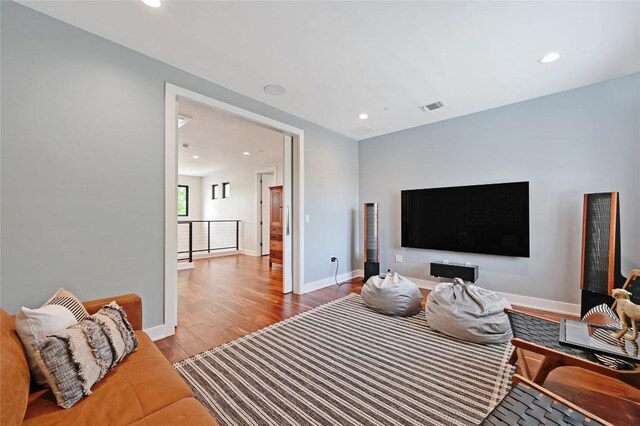 3102 Hunt Trl, Austin, TX 78757 - bedroom featuring wood finished floors, recessed lighting, and baseboards