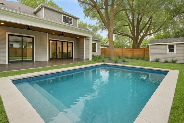 3102 Hunt Trl, Austin, TX 78757 - view of pool featuring a ceiling fan and an outbuilding
