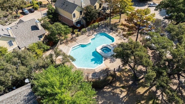drone / aerial view of a pool