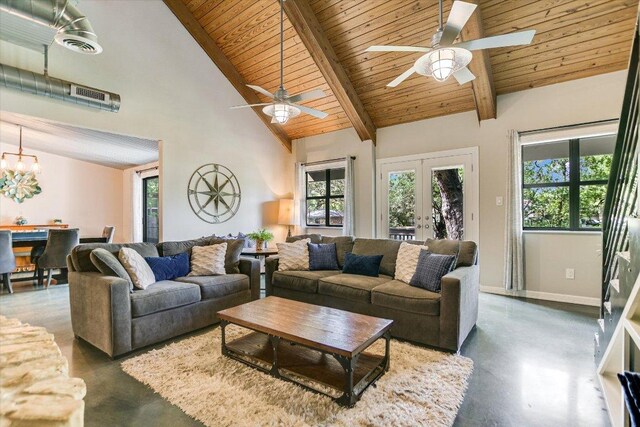 5307 Shady Oaks Cir, Kingsland, TX 78639 - living room with concrete floors, wooden ceiling, beam ceiling, a ceiling fan, and baseboards