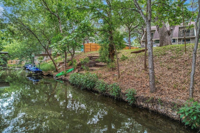 5307 Shady Oaks Cir, Kingsland, TX 78639 - dock with fence and a water view