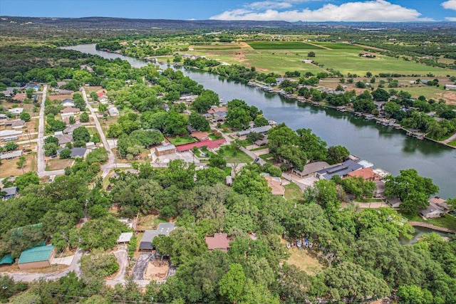 5307 Shady Oaks Cir, Kingsland, TX 78639 - aerial view of property and surrounding area featuring a large body of water and nearby suburban area