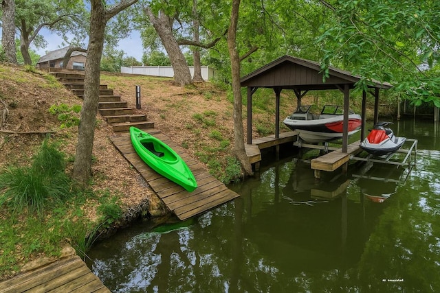 5307 Shady Oaks Cir, Kingsland, TX 78639 - dock featuring boat lift, stairway, and a water view
