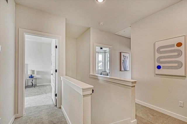 2600 Gattis School Rd Unit 401, Round Rock, TX 78664 - hallway with an upstairs landing, light colored carpet, and baseboards