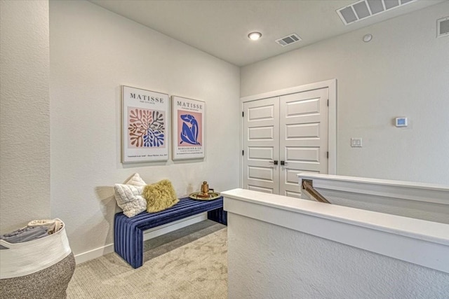 2600 Gattis School Rd Unit 401, Round Rock, TX 78664 - hallway featuring light colored carpet and baseboards