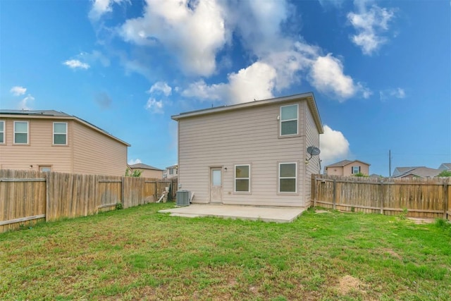 rear view of property featuring a patio area and cooling unit