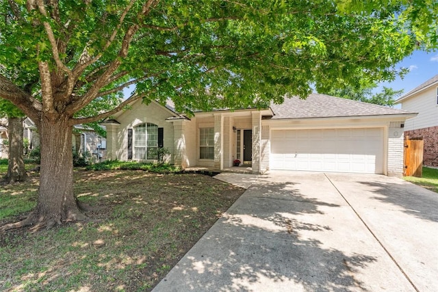 4329 Rock Hill Rd, Round Rock, TX 78681 - single story home featuring a garage, concrete driveway, fence, brick siding, and a shingled roof