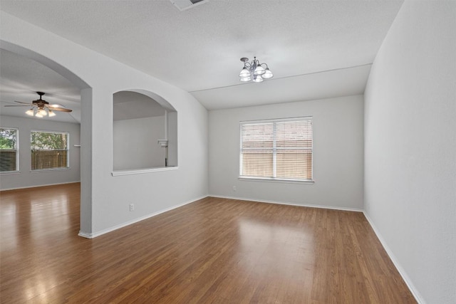 4329 Rock Hill Rd, Round Rock, TX 78681 - spare room featuring wood finished floors, ceiling fan, and a chandelier