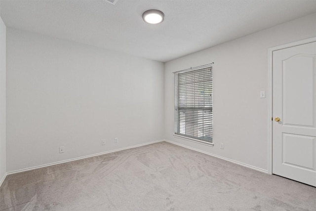 4329 Rock Hill Rd, Round Rock, TX 78681 - carpeted empty room with baseboards