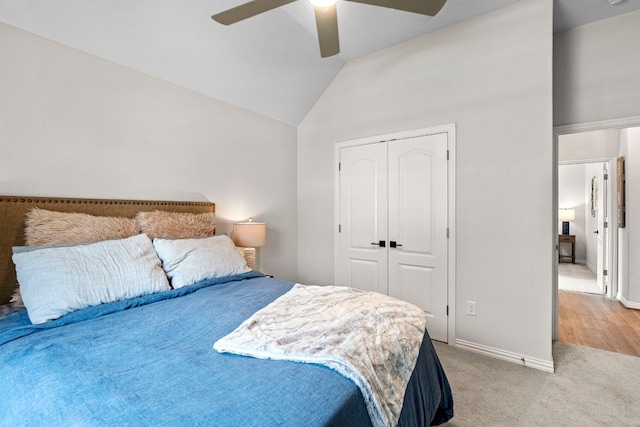 115 Oleander Loop, Buda, TX 78610 - bedroom with a closet, vaulted ceiling, ceiling fan, and light colored carpet