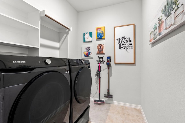 115 Oleander Loop, Buda, TX 78610 - washroom with separate washer and dryer and tile patterned floors