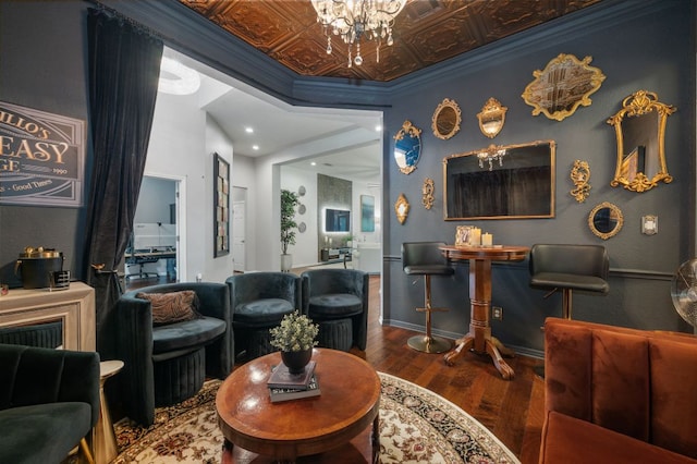 3016 Sunland Dr, Austin, TX 78748 - living area with wood finished floors, a chandelier, crown molding, an ornate ceiling, and recessed lighting