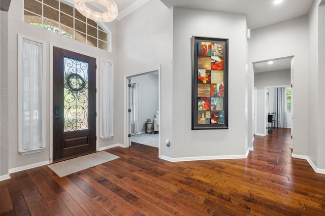 3016 Sunland Dr, Austin, TX 78748 - entrance foyer with dark wood-style floors, a high ceiling, and recessed lighting
