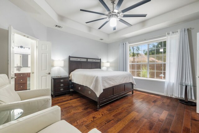 3016 Sunland Dr, Austin, TX 78748 - bedroom with a raised ceiling, hardwood / wood-style flooring, and a ceiling fan