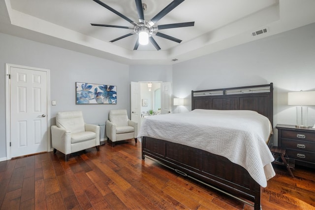 3016 Sunland Dr, Austin, TX 78748 - bedroom with a raised ceiling, wood-type flooring, and a ceiling fan