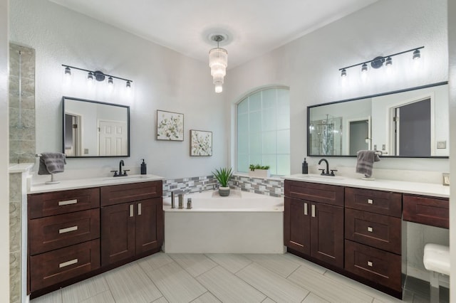3016 Sunland Dr, Austin, TX 78748 - full bath featuring two vanities and a bath