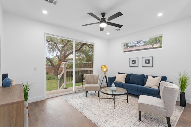 1208 W Oltorf St Unit B, Austin, TX 78704 - living room featuring wood finished floors, baseboards, ceiling fan, and recessed lighting