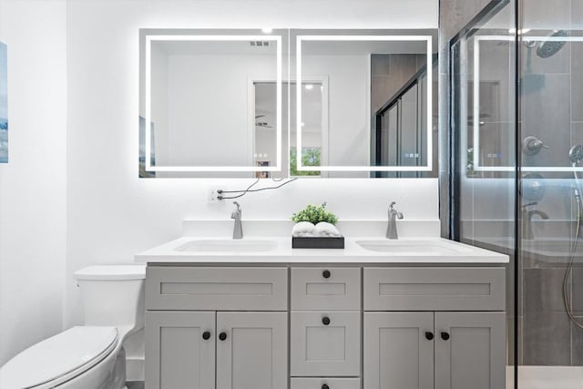 1208 W Oltorf St Unit B, Austin, TX 78704 - bathroom featuring double vanity and a shower stall