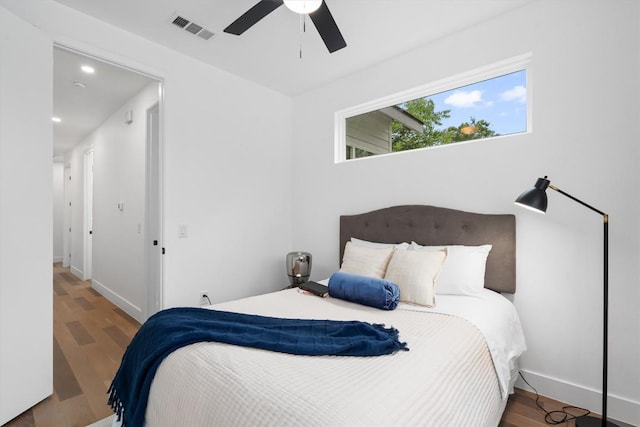 1208 W Oltorf St Unit B, Austin, TX 78704 - bedroom featuring wood finished floors, recessed lighting, and a ceiling fan