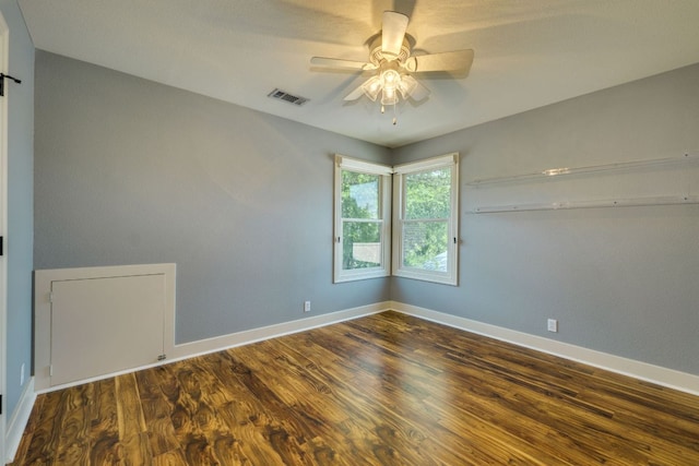 2112 W 11th St, Austin, TX 78703 - unfurnished room featuring ceiling fan, wood finished floors, and baseboards