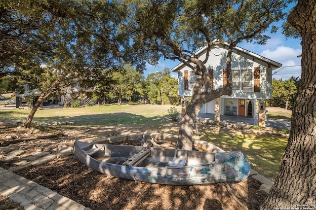 693 Riviera Dr, Canyon Lake, TX 78133 - view of grassy yard