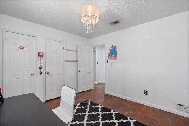home office featuring a chandelier, baseboards, tile patterned floors, and a textured ceiling