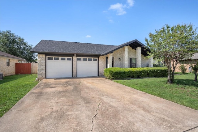view of front of property featuring a garage, concrete driveway, brick siding, and roof with shingles