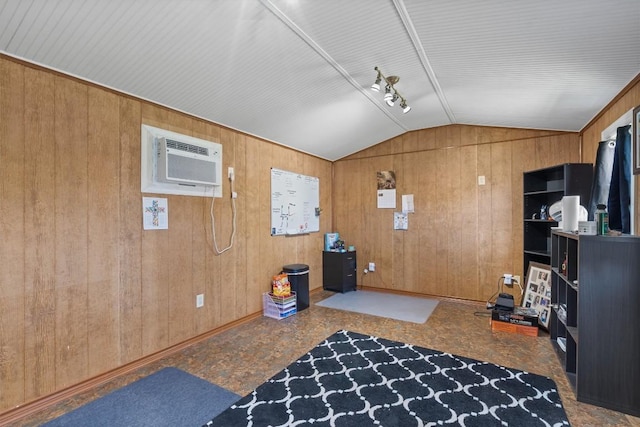 miscellaneous room with vaulted ceiling, a wall mounted AC, and wood walls