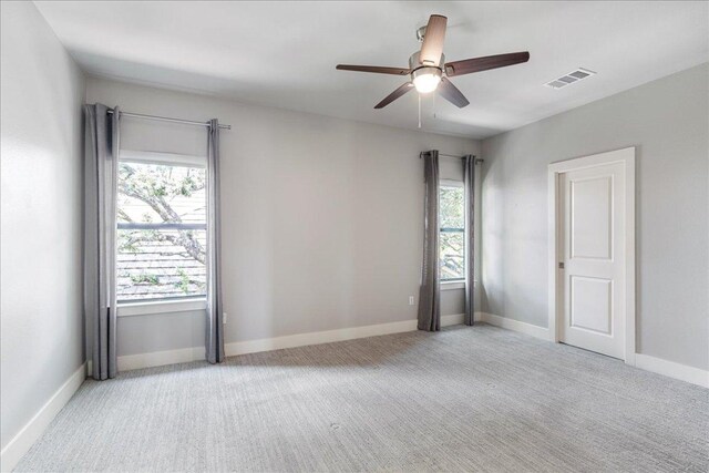 27 Wingreen Loop, The Hills, TX 78738 - carpeted spare room featuring a ceiling fan and baseboards