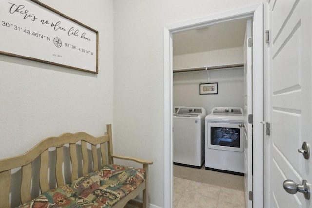 6032 Urbano Bnd, Round Rock, TX 78665 - washroom featuring washing machine and dryer and light tile patterned floors