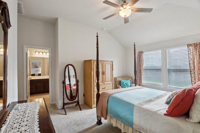 6032 Urbano Bnd, Round Rock, TX 78665 - bedroom with lofted ceiling, light carpet, a ceiling fan, and connected bathroom
