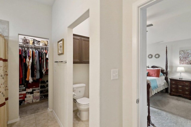 6032 Urbano Bnd, Round Rock, TX 78665 - ensuite bathroom featuring toilet and tile patterned floors