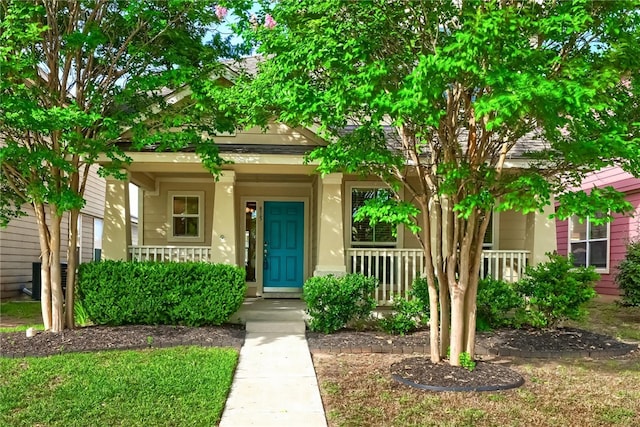 view of front of property featuring covered porch