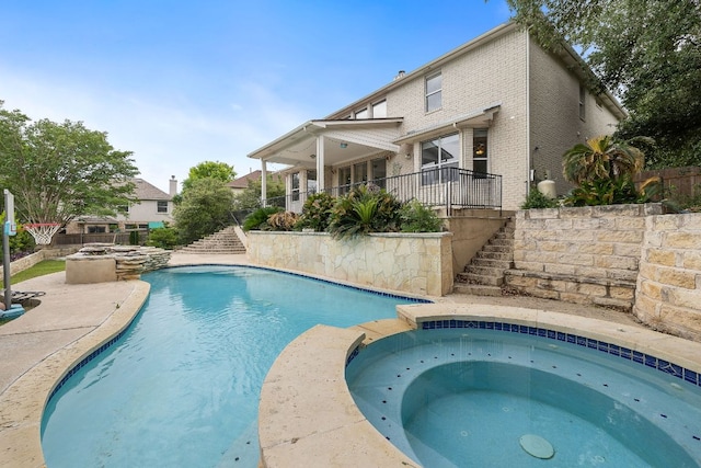 3805 Durnberry Ln, Round Rock, TX 78664 - view of pool with stairs, a pool with connected hot tub, and a patio area
