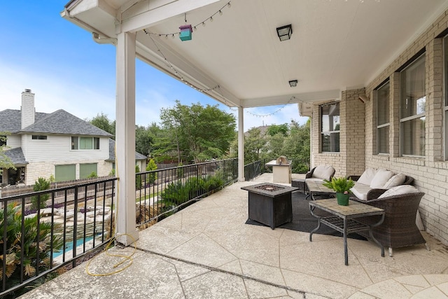 3805 Durnberry Ln, Round Rock, TX 78664 - view of patio / terrace featuring an outdoor living space with a fire pit