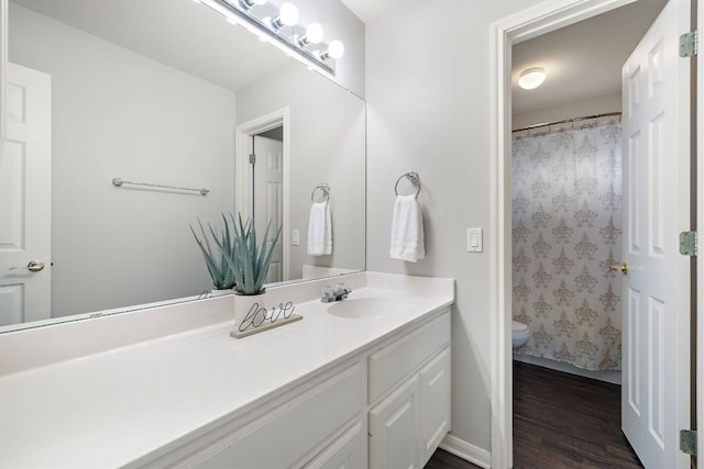 3805 Durnberry Ln, Round Rock, TX 78664 - full bathroom featuring vanity and wood finished floors
