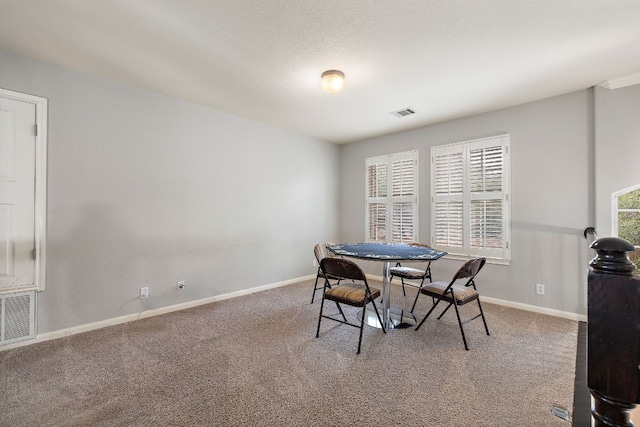 3805 Durnberry Ln, Round Rock, TX 78664 - carpeted dining area with baseboards