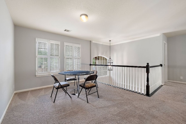3805 Durnberry Ln, Round Rock, TX 78664 - carpeted dining area with baseboards and a chandelier