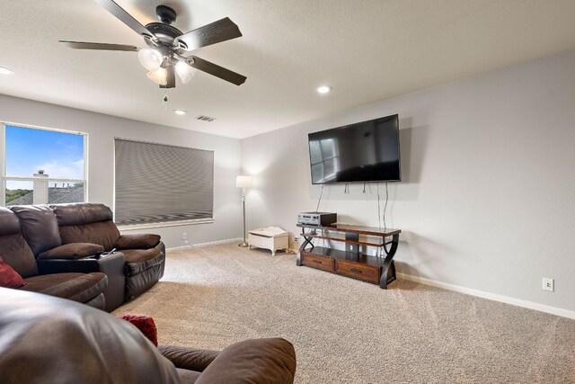 3805 Durnberry Ln, Round Rock, TX 78664 - living room with carpet flooring, a ceiling fan, and recessed lighting