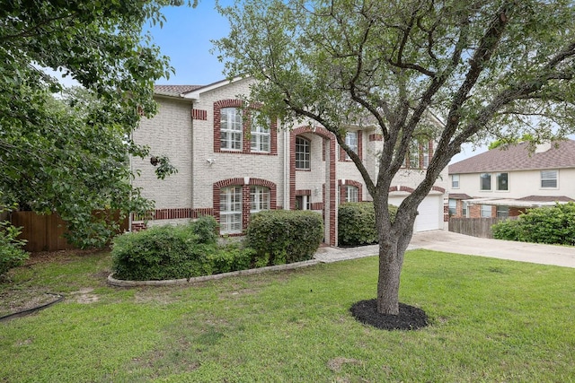 3805 Durnberry Ln, Round Rock, TX 78664 - view of front of home featuring brick siding, concrete driveway, and a garage