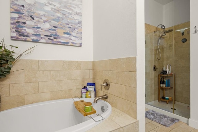2520 Bluebonnet Ln Unit 32, Austin, TX 78704 - bathroom featuring a tile shower, a bath, and tile patterned flooring